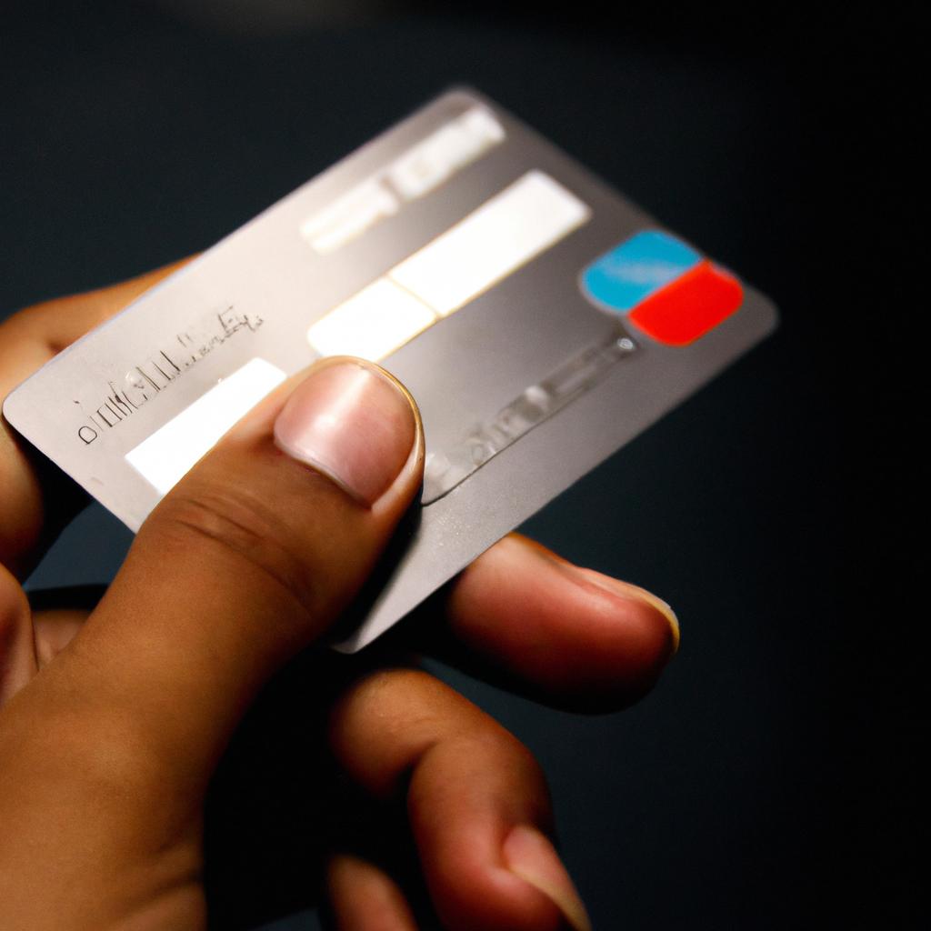 Person holding debit card, choosing